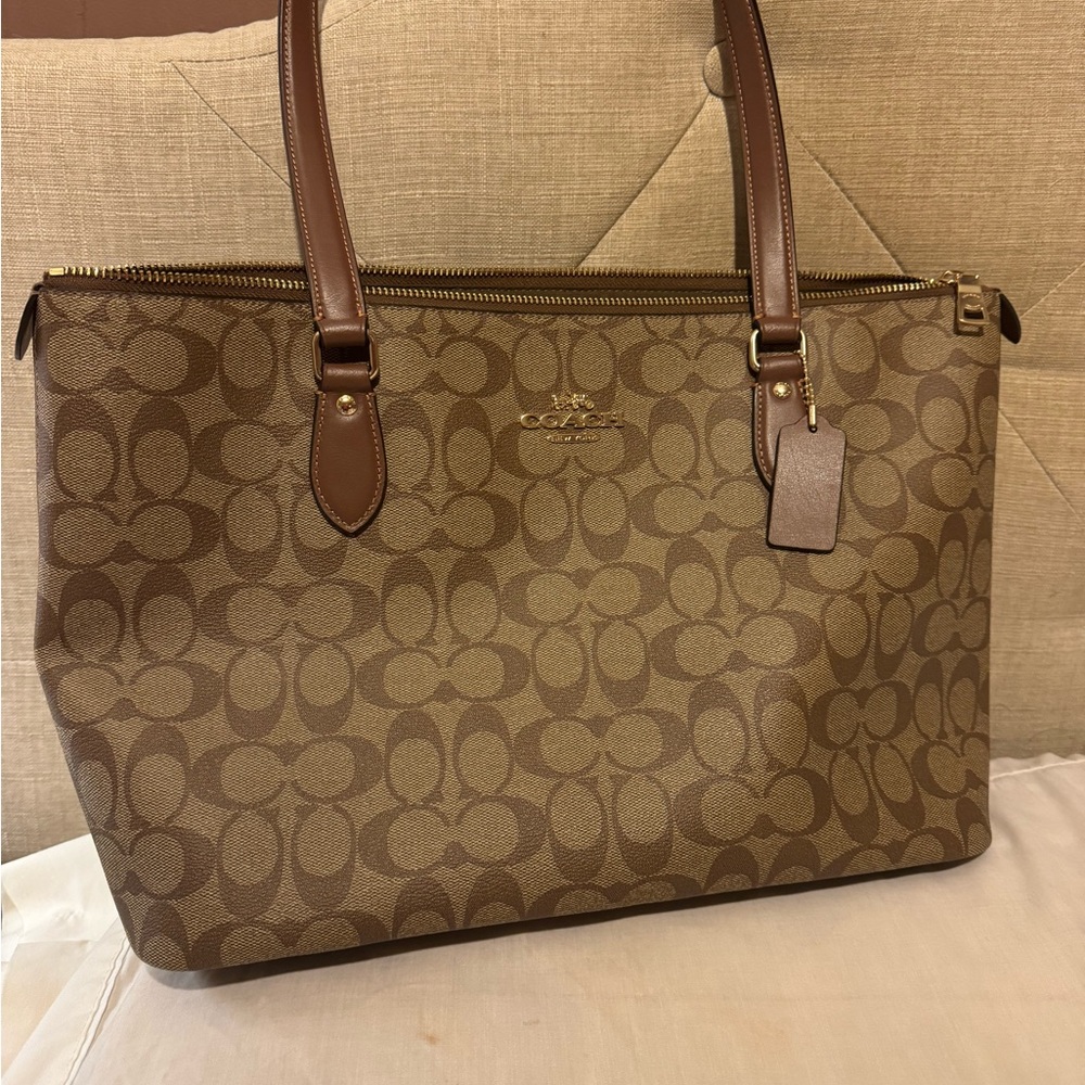 Coach Brown Hobo Bag with Monogram Pattern